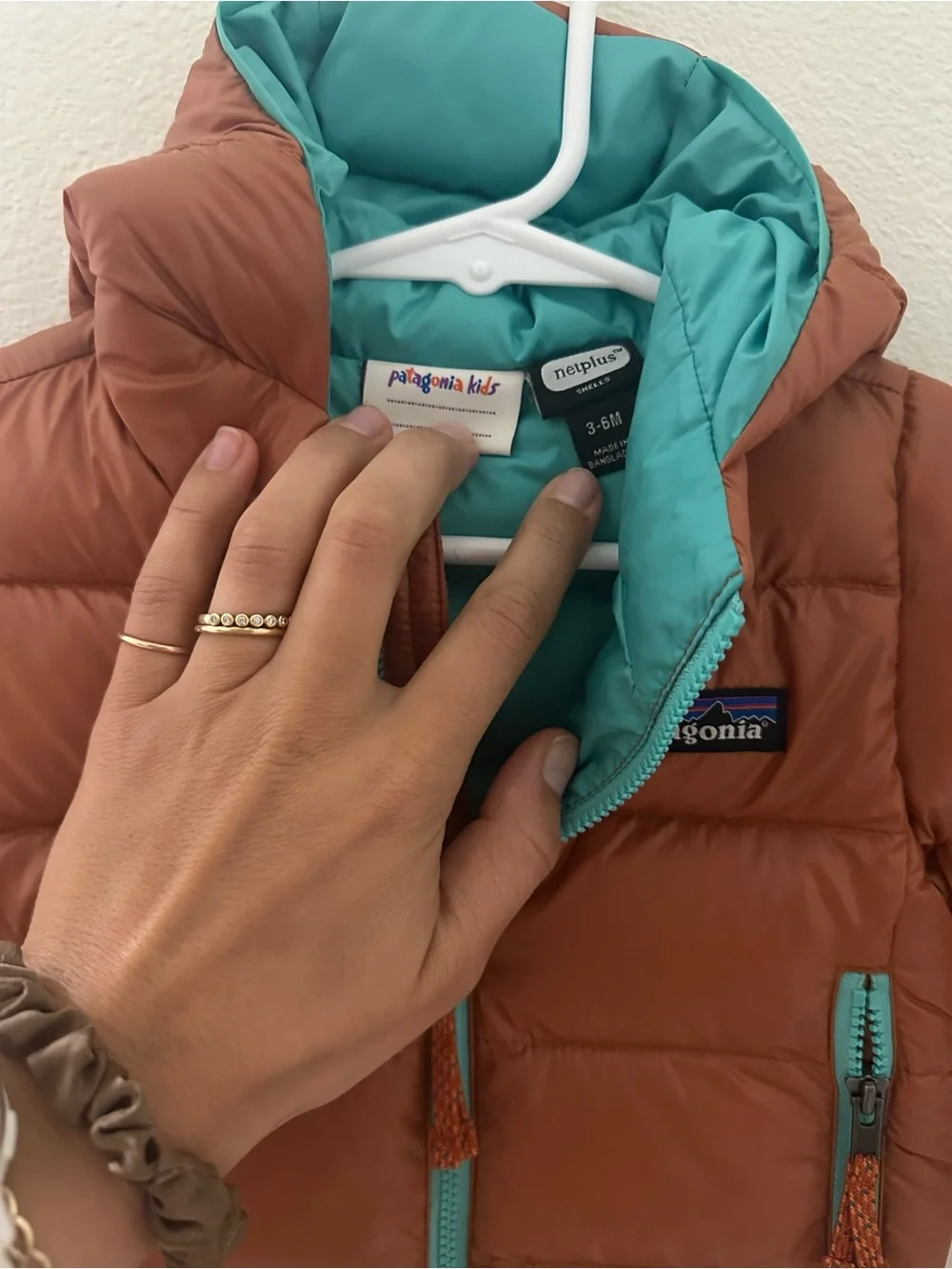 Patagonia Kids Rust Puffer Jacket with Teal Accents